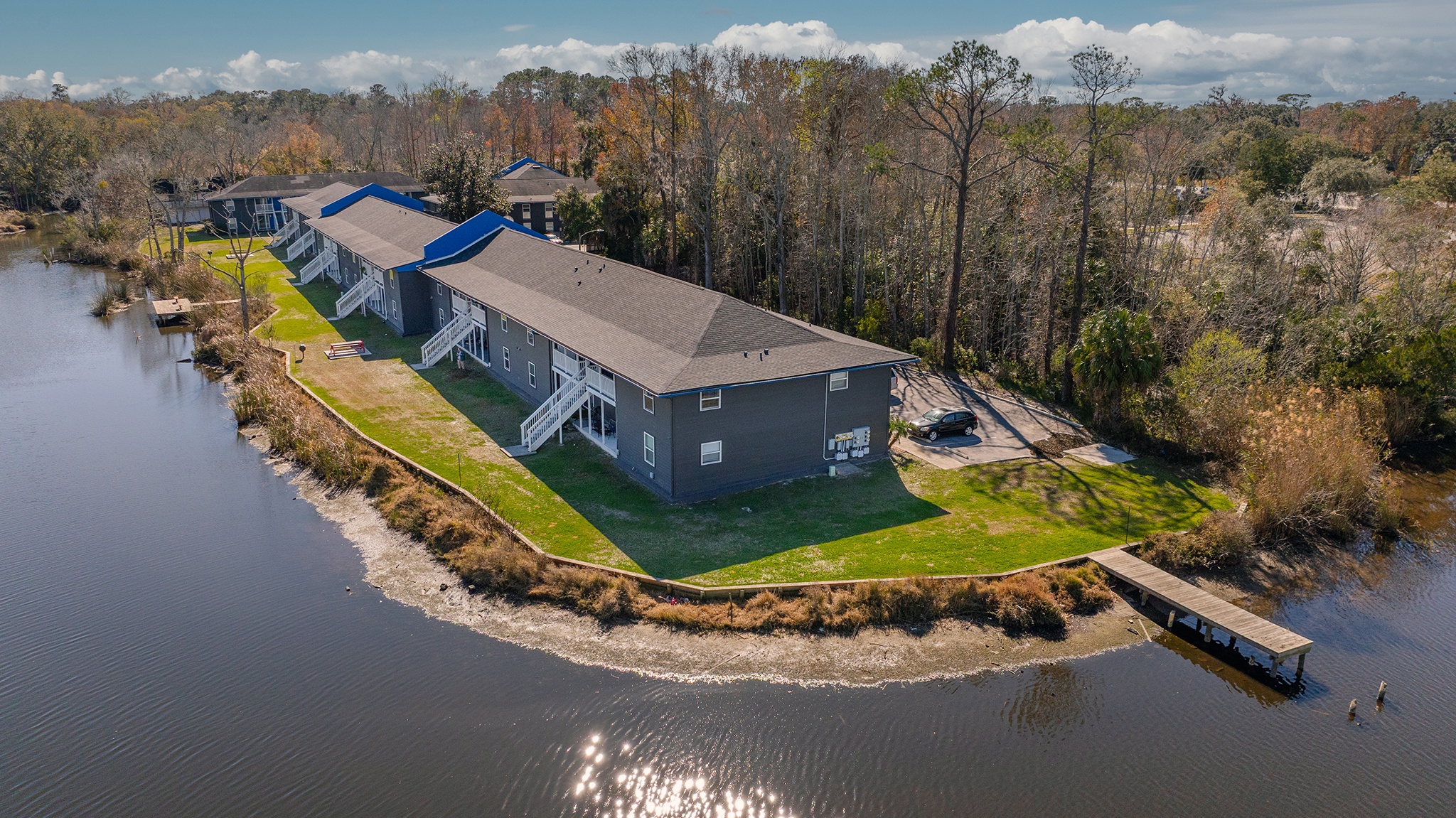 Mandarin Bay Apartments aerial view with water docks